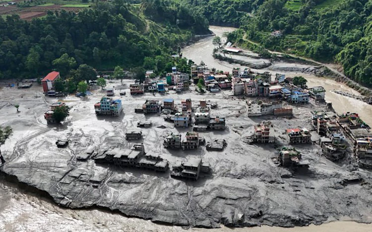 Hundreds killed, more than 1,000 missing in Nepal and China after Himalayan flood