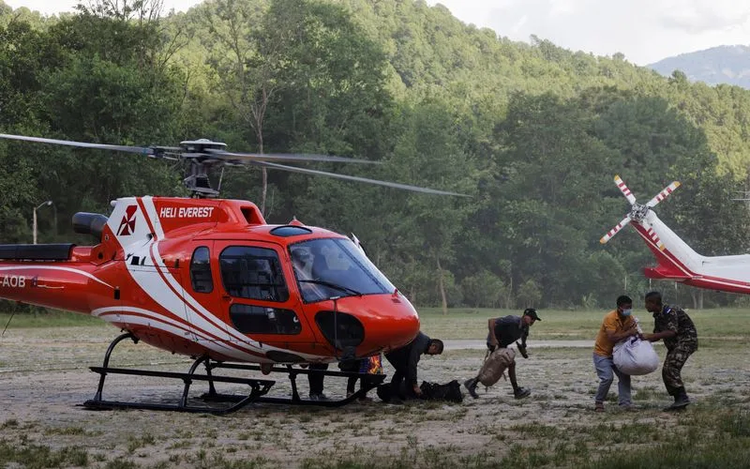 Rescuers scour Nepal flood debris as risk of fresh flooding grows