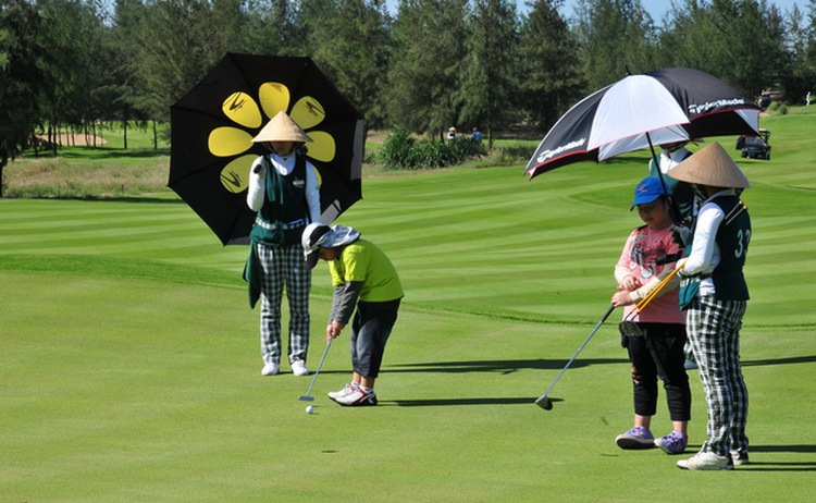 Behind Vietnamese golf courses