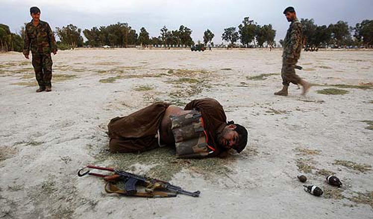 Suicide bomber in uniform kills 12 Afghan police