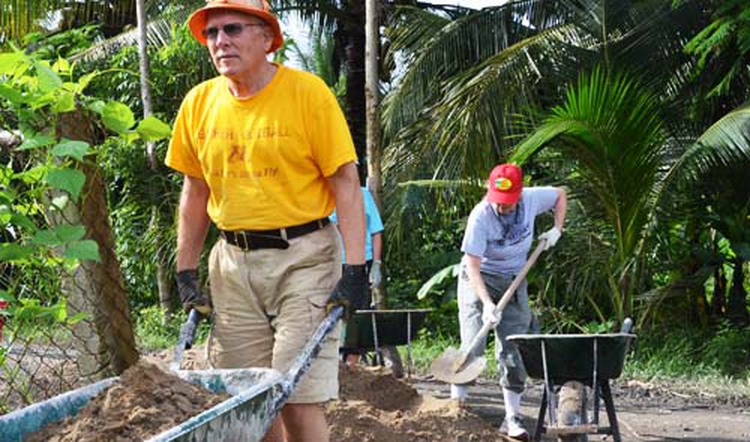 Volunteers build 25 houses for vulnerable families