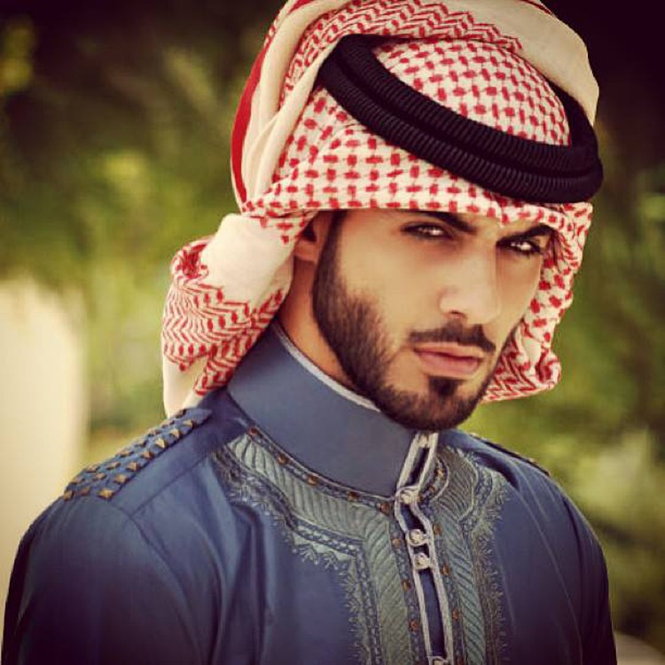 Man "deported for being too handsome" to strut with local fans