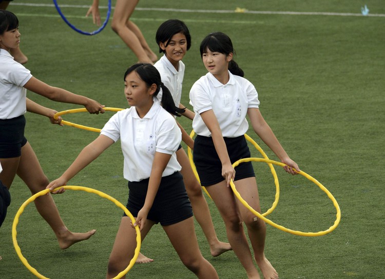 Japan's Princess Aiko performs gymnastics at school's athletic festival