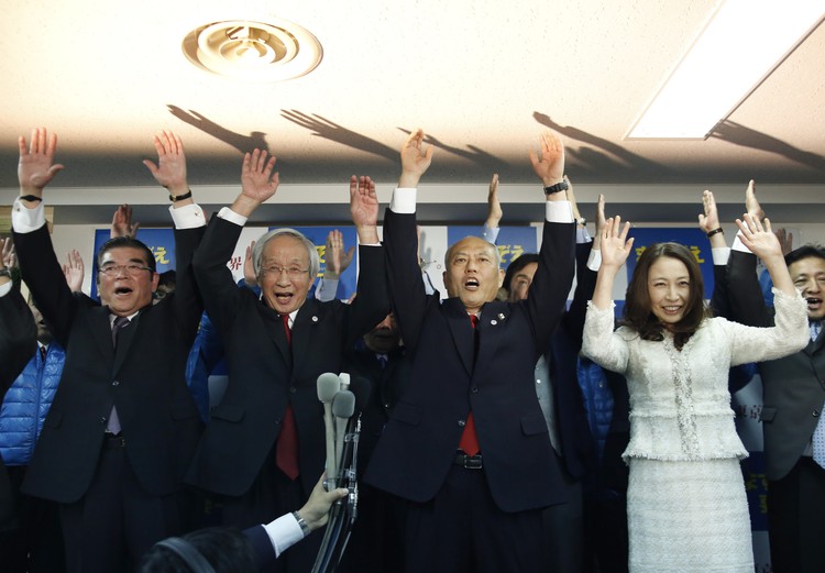 Japan ruling party candidate elected Tokyo governor, aiding Abe