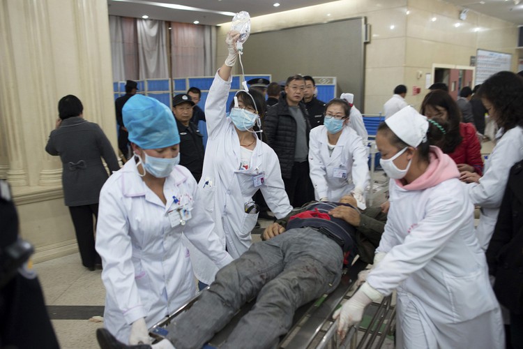 Witnesses recall fear, chaos after China train station attack