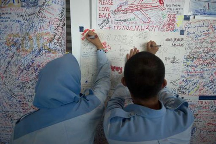 MH370 relatives rage as Malaysia probes 'deleted' data