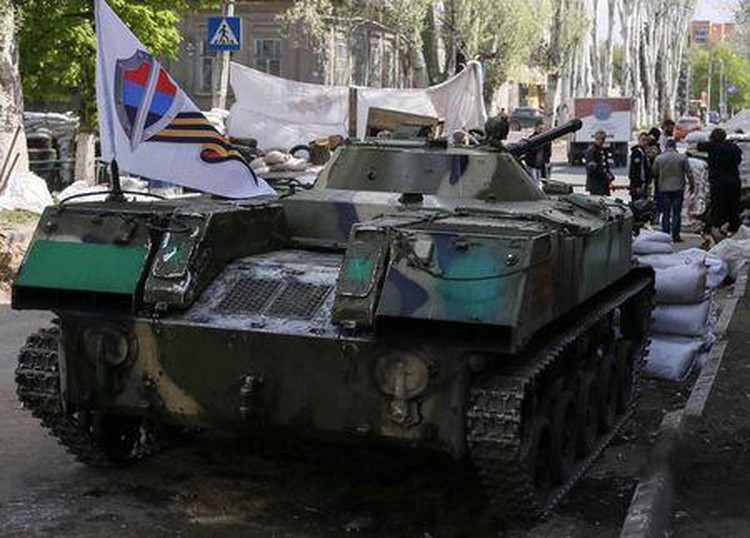 Ukraine's leaders say have U.S. backing to take on "aggressors"