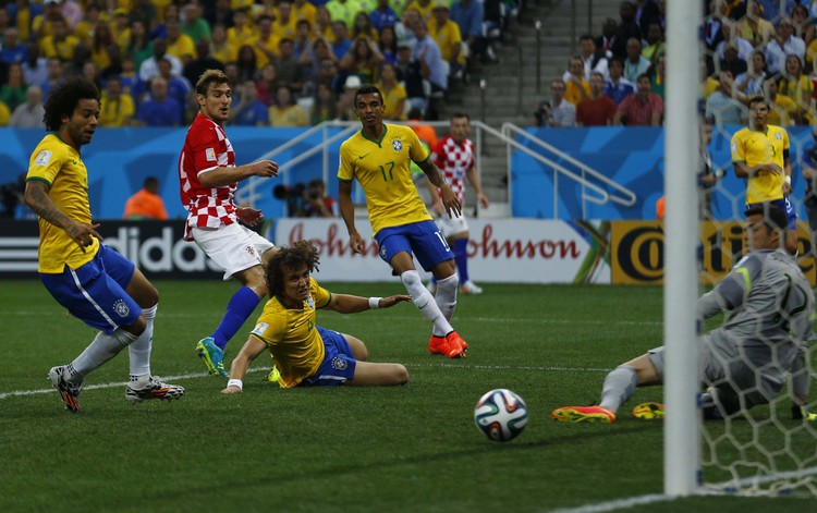 Neymar rescues Brazil in World Cup opener