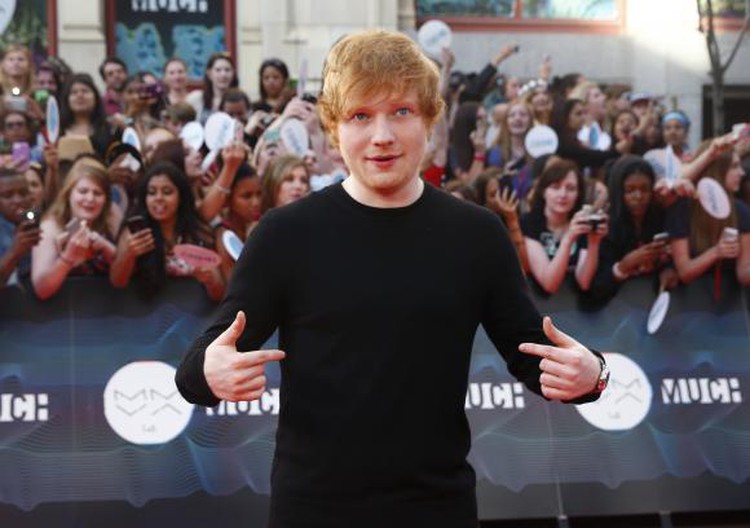 Britain's Ed Sheeran charts at No.1, breaks 2014 album sales record