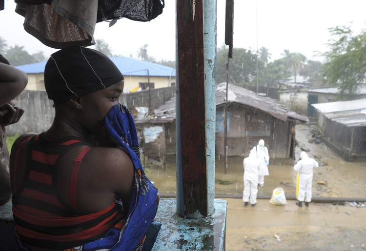 Liberia 'losing grip on Ebola' as hunt for patients goes on