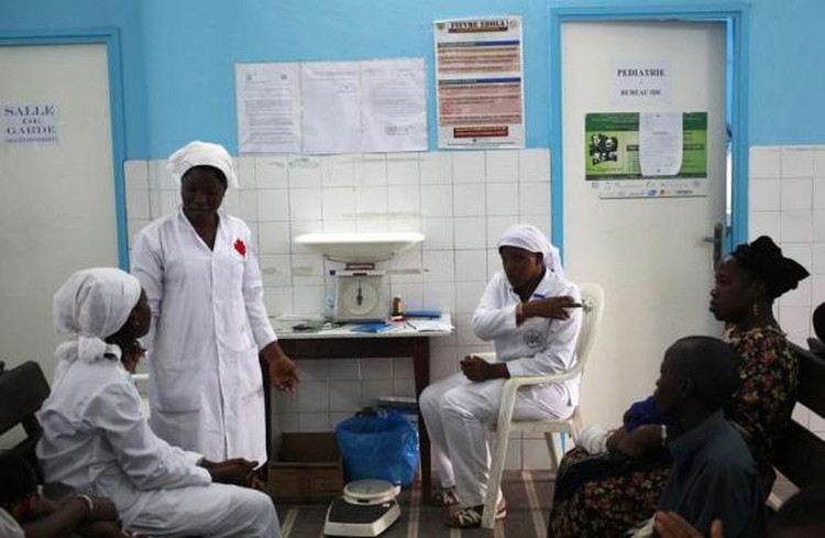 Liberia fights Ebola in capital, W. Africa toll tops 1,200