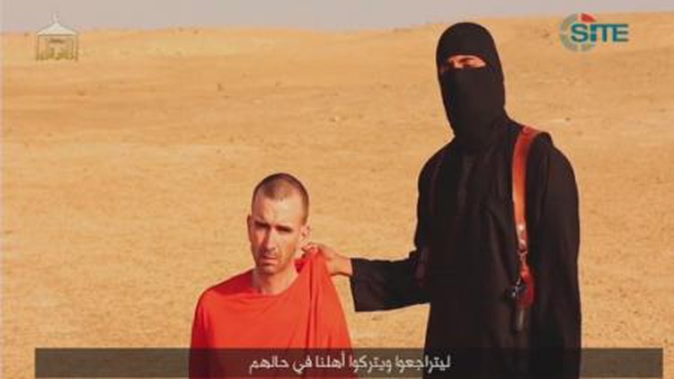 Islamic State video purports to show beheading of UK hostage David Haines