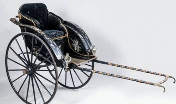 Vietnamese royal rickshaw bound for home