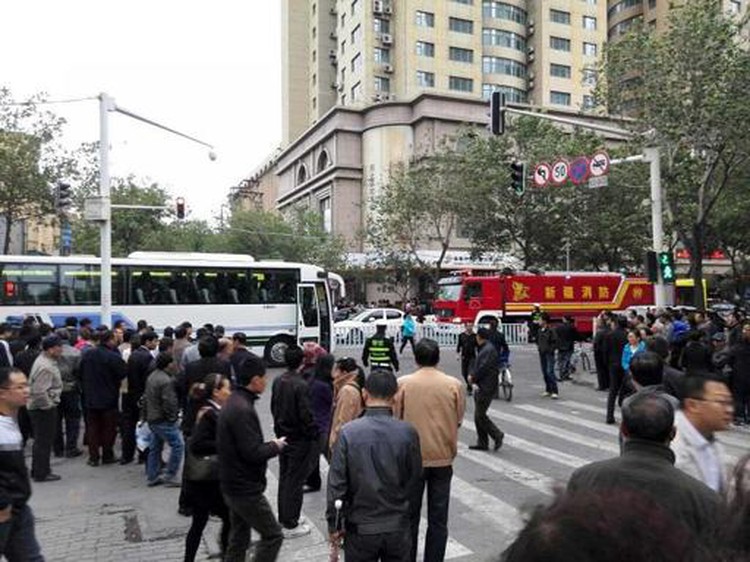 China sentences eight to death for terror attacks in Xinjiang