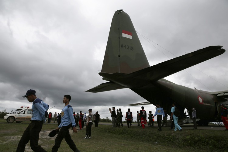 AirAsia victim with life jacket raises questions about plane's last moments