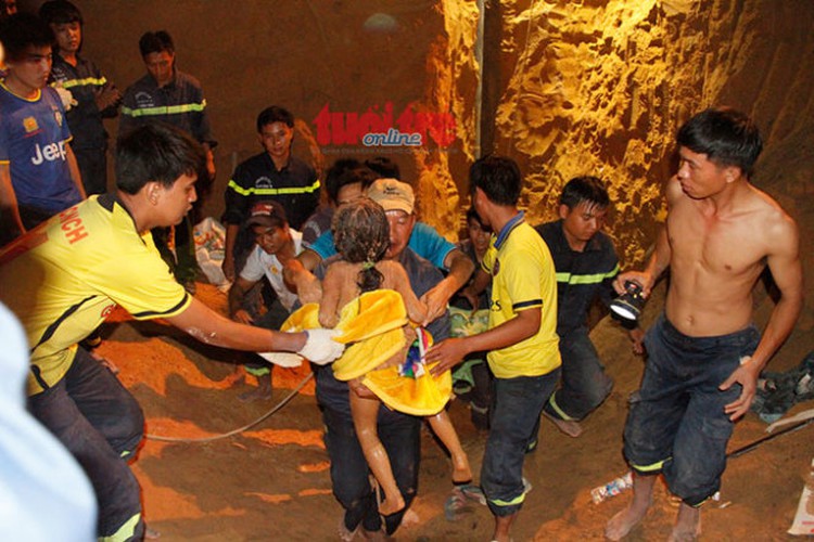 Girl saved 9 hours after falling into deep hole in southern Vietnam