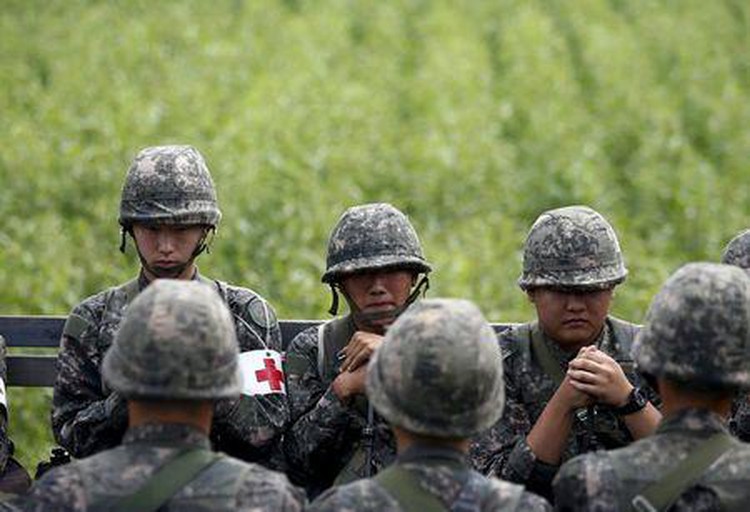North, South Korea talk all night, to resume Sunday, in bid to end standoff