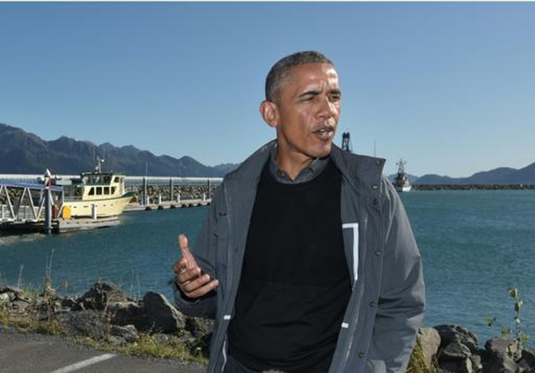 Obama tours glacier to highlight march of climate change