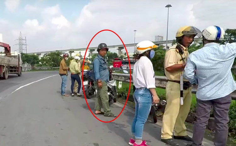 Ho Chi Minh City police verify ‘assistant’ protecting traffic cops from being filmed