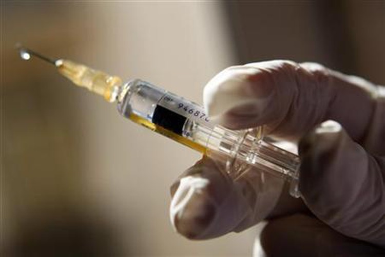 Nurse uses infusion tube on multiple patients in southern Vietnam