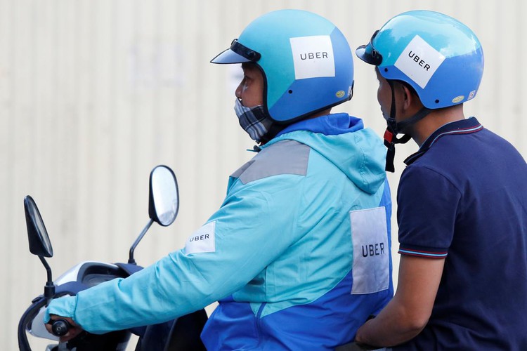 Uber signs first Southeast Asian e-wallet deal with Vietnam's MoMo