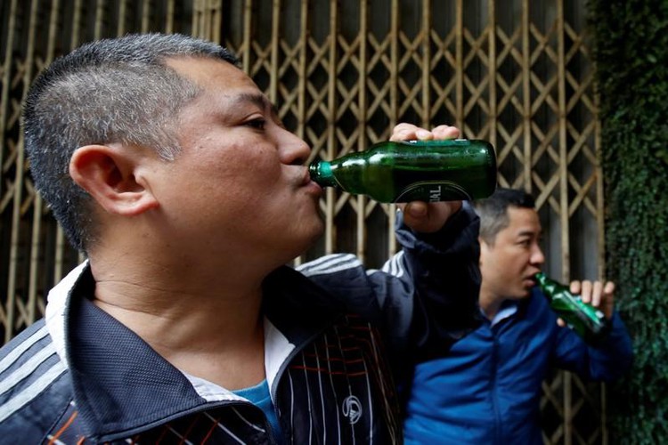 Vietnam to sell majority of top brewer Sabeco but caps foreign limit