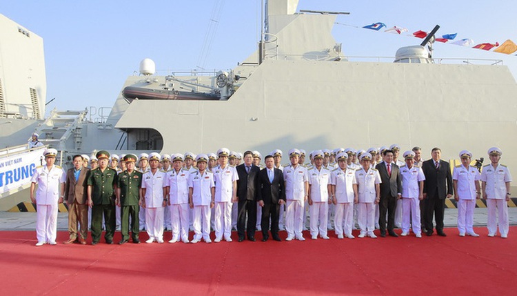 Vietnam hoists flags on two missile escort warships