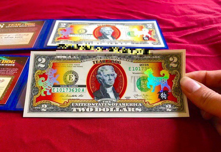Foreign money bearing canine images boasts booming trade ahead of Lunar New Year