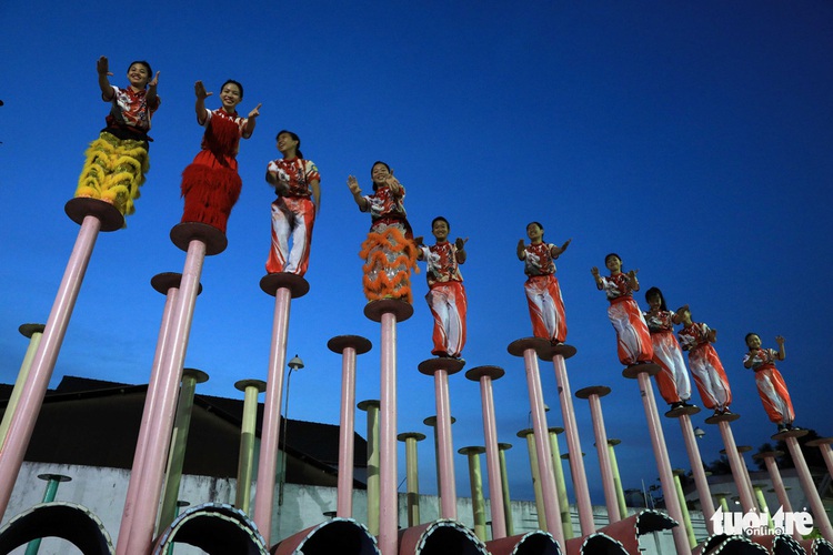 ​In high-pole lion dance, Vietnamese women prove they match male peers