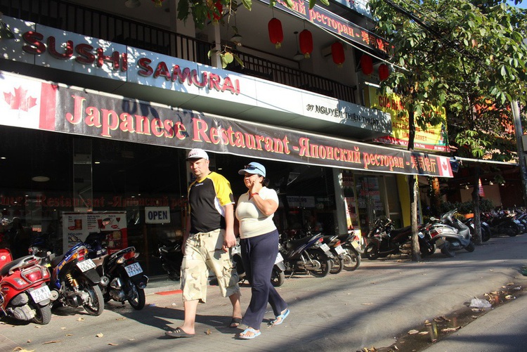 Foreign languages dominate shop signs in Da Nang