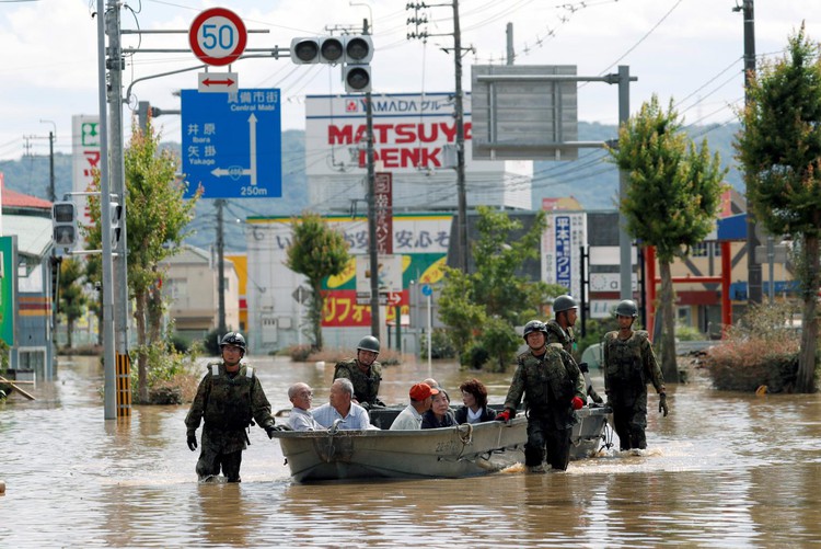 'Unprecedented' rain strands at least 1,000, kills at least 66 in Japan