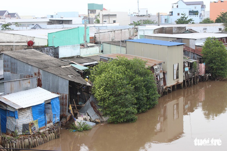 Residents take fright as houses sink into water overnight in southern Vietnam