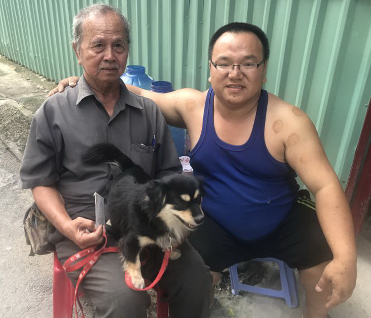Vietnamese parking lot attendant, himself an orphan, houses homeless senior