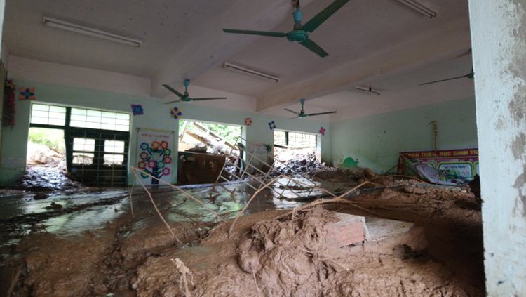 Students wrestle with flood aftermath as school year starts in Vietnam