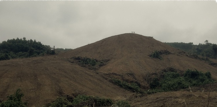 Excavators used to destroy natural forest in north-central Vietnam