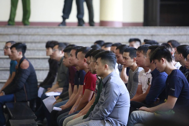 Vietnam court opens trial for online gambling ring involving former top cops