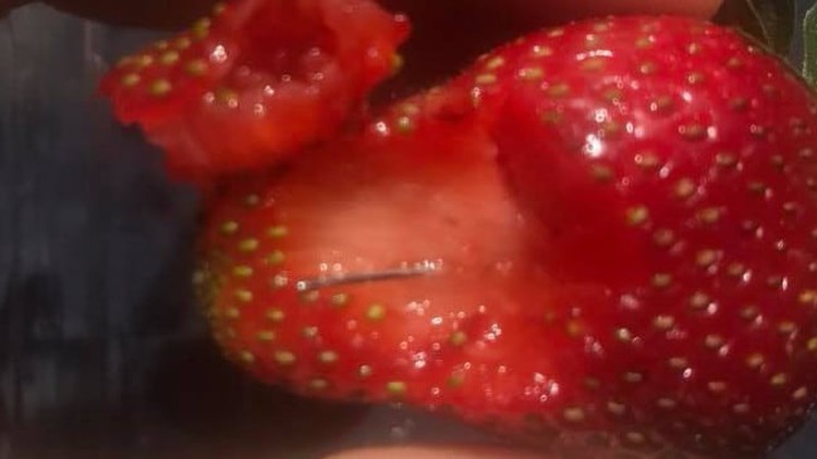 Woman with apparent Vietnamese name arrested in Australia over strawberry needle scare