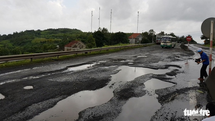 National highway in south-central Vietnam ruined by giant potholes