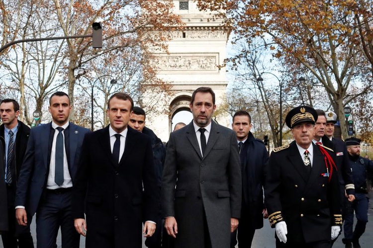 Macron tells PM to hold talks after worst unrest in Paris for decades
