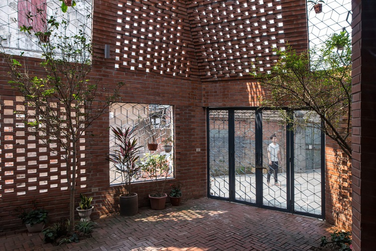 Stunning brick ‘cave house’ inspired by ancient human habitation built in Hanoi