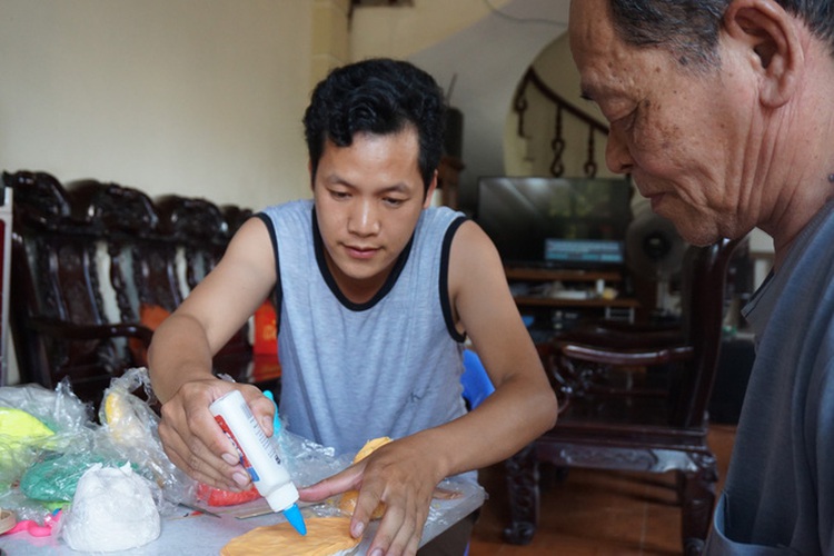A forgotten Vietnamese powder figurine finds its back to children’s hearts