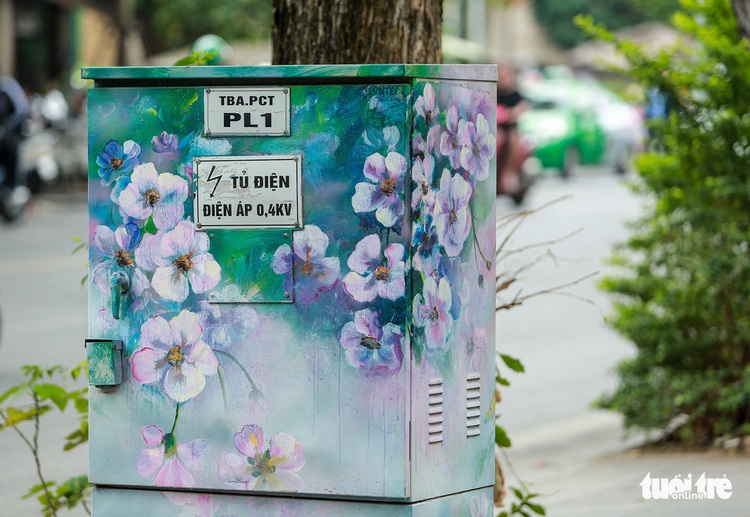 Electric cabinets in Hanoi painted in colors for New Year