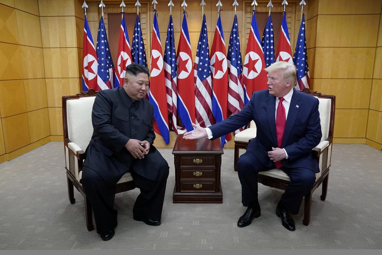 Trump sets foot in North Korea, agrees with Kim to resume talks