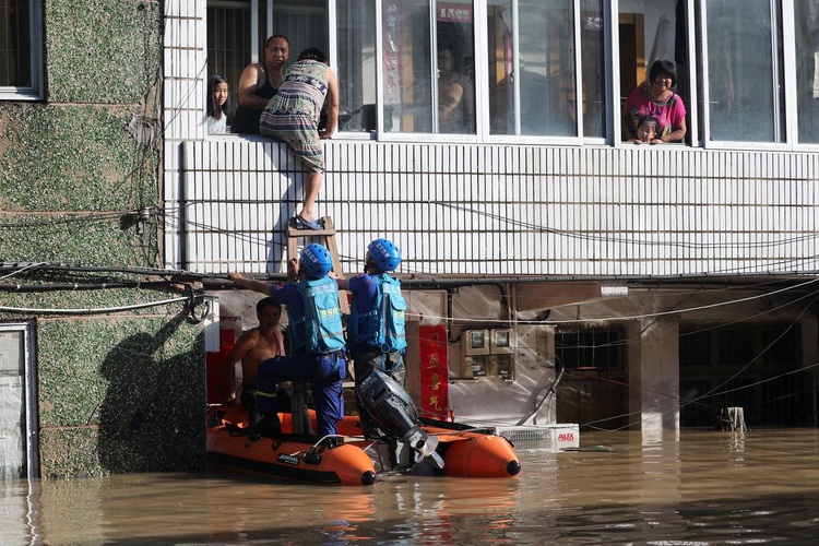 Death toll from typhoon in eastern China rises to 32 as storm moves north