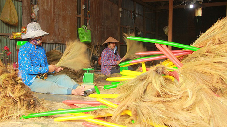 Vietnam man swept along by traditional broom-making craft in Mekong Delta