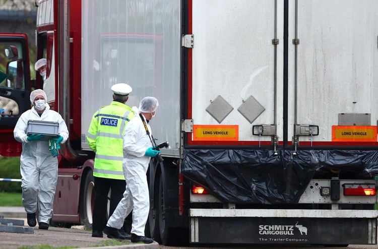 Vietnam says trying to speed up identification of UK truck dead