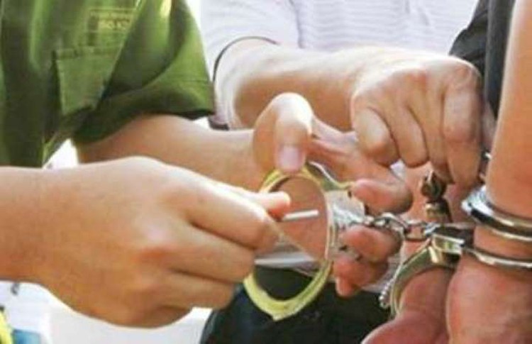 In Vietnam, district court official discovered being wanted for 26 years