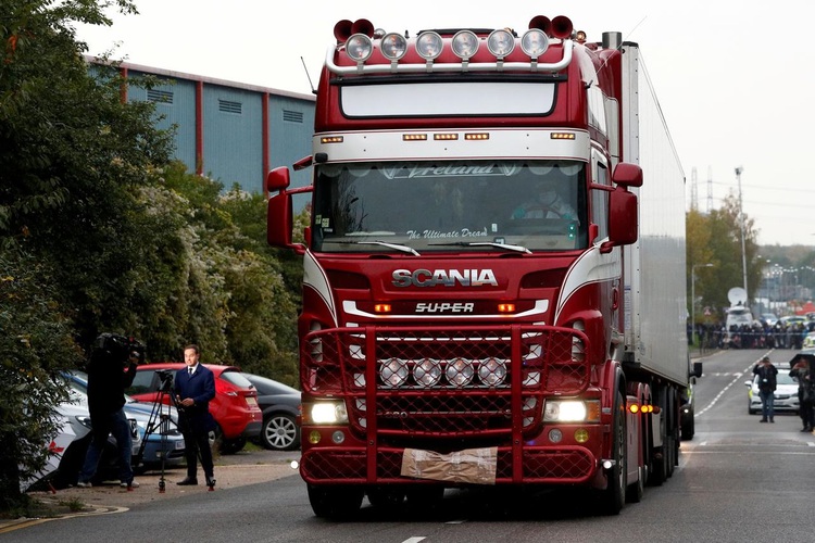 Vietnam police charge seven over Britain truck deaths
