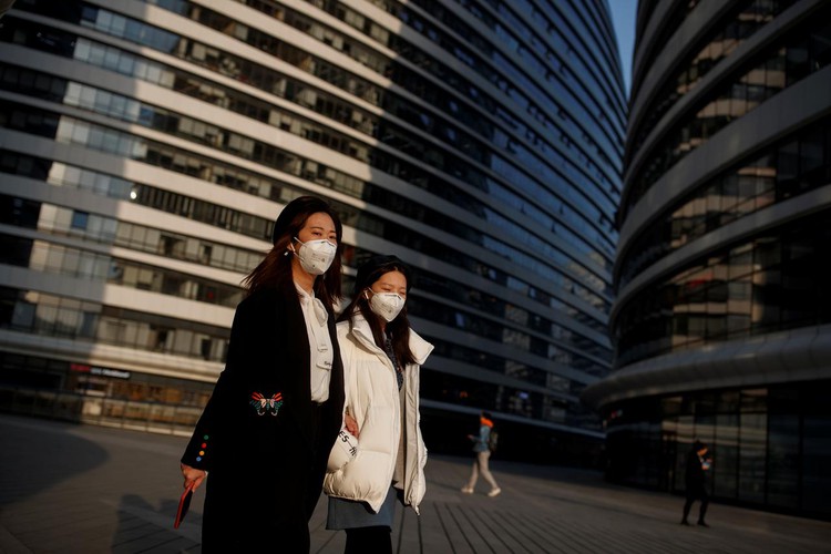China says coronavirus peak has passed as epicenter logs single-digit new cases