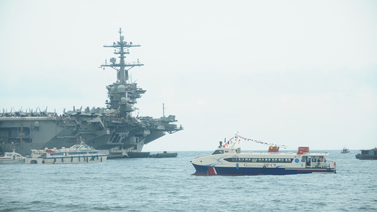 Introducing Vietnam’s fast ferry crew tasked with servicing US aircraft carriers